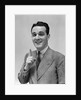 1940s Man In Suit Holding Up Index Finger Making A Point by Anonymous