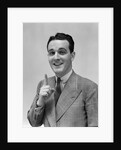 1940s Man In Suit Holding Up Index Finger Making A Point by Anonymous