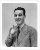 1940s Man In Suit Holding Up Index Finger Making A Point by Anonymous