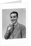 1940s Man In Suit Holding Up Index Finger Making A Point by Anonymous