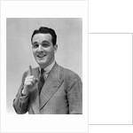 1940s Man In Suit Holding Up Index Finger Making A Point by Anonymous