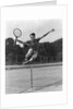 1930s Teenage Boy Tennis Player Jumping Net With Racket In Hand by Anonymous