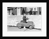 1930s 1940s Little Boy Playing In Toy Car Outside In Snow by Anonymous