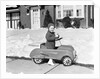 1930s 1940s Little Boy Playing In Toy Car Outside In Snow by Anonymous