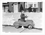1930s 1940s Little Boy Playing In Toy Car Outside In Snow by Anonymous