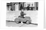 1930s 1940s Little Boy Playing In Toy Car Outside In Snow by Anonymous
