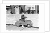1930s 1940s Little Boy Playing In Toy Car Outside In Snow by Anonymous