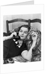 1930s Young Brunette Woman Reclining On Pillows Cigarette In Hand Talking On Telephone by Anonymous
