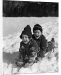 1930 1930s Boy And Girl Laughing Sledding In Snow by Anonymous