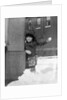 1930s Boy Peeking Around Side Building Throwing A Snowball Winter by Anonymous