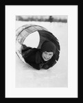 1920s Boy Playing Lying In Snow Rolling In Wooden Barrel by Anonymous