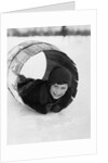 1920s Boy Playing Lying In Snow Rolling In Wooden Barrel by Anonymous