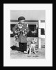 1940s Boy With Puppy On Leash Holding Christmas Present by Anonymous