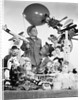 1950s Father With Son Holding Balloon Surrounded By Toys and Stuffed Animals by Anonymous