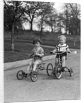 1930s Two Boys Riding Tricycles by Anonymous