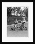1930s Two Boys Riding Tricycles by Anonymous