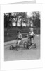 1930s Two Boys Riding Tricycles by Anonymous