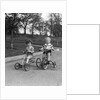1930s Two Boys Riding Tricycles by Anonymous