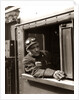 1920s 1930s 1940s Railroad Train Engineer Looking Out Window Of Locomotive Cab Driving The Steam Engine by Anonymous