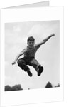 950s Boy Jumping Up by Anonymous