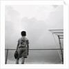 Boy in baseball uniform by Anonymous