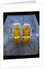 Two Glass Mugs of Beer on Table by Anonymous
