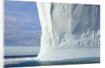 Massive Tabular Iceberg Sculpted by Waves by Anonymous