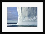 Massive Tabular Iceberg Sculpted by Waves by Anonymous