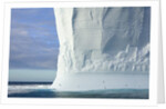 Massive Tabular Iceberg Sculpted by Waves by Anonymous