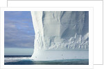 Massive Tabular Iceberg Sculpted by Waves by Anonymous