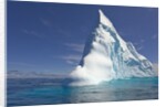Pointy Blue Iceberg Sculpted by Waves by Anonymous