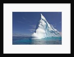 Pointy Blue Iceberg Sculpted by Waves by Anonymous