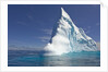 Pointy Blue Iceberg Sculpted by Waves by Anonymous