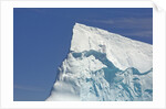 Pointy Blue Iceberg Sculpted by Waves by Anonymous