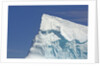 Pointy Blue Iceberg Sculpted by Waves by Anonymous