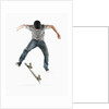 Young Skateboarder Doing Trick by Anonymous