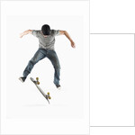 Young Skateboarder Doing Trick by Anonymous
