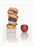 Stack of Donuts and One Apple by Anonymous