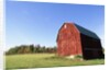 Barn in a field by Anonymous