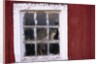 Cat sitting in a barn window by Anonymous