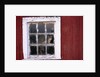 Cat sitting in a barn window by Anonymous