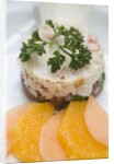 Crab and tropical fruit timbale with endive, melon and orange at The Sugar Mill, Tortola, British Virgin Islands by Anonymous