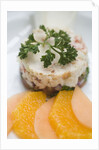 Crab and tropical fruit timbale with endive, melon and orange at The Sugar Mill, Tortola, British Virgin Islands by Anonymous