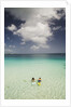 Couple Snorkeling in Cinnamon Bay at St. John Island by Anonymous