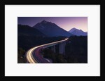 Light Trails on Mountain Pass by Anonymous
