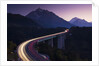 Light Trails on Mountain Pass by Anonymous