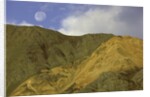 Full moon setting over mountain in Kluane National Park by Anonymous