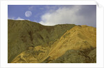 Full moon setting over mountain in Kluane National Park by Anonymous