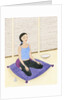 Woman Meditating on Blue Pillow by Anonymous