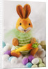 Toy bunny with candy eggs by Anonymous